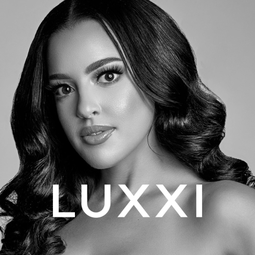 Headshot image of Jasmine Shamberger, founder of Luxxi, with Luxxi brand logo over the image