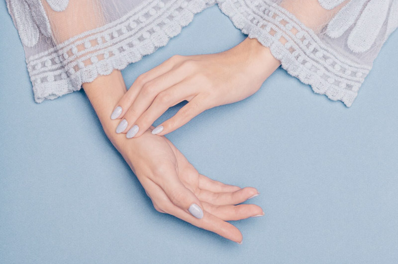 light blue nails on matching background
