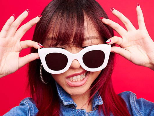 Woman with black cherry colored hair